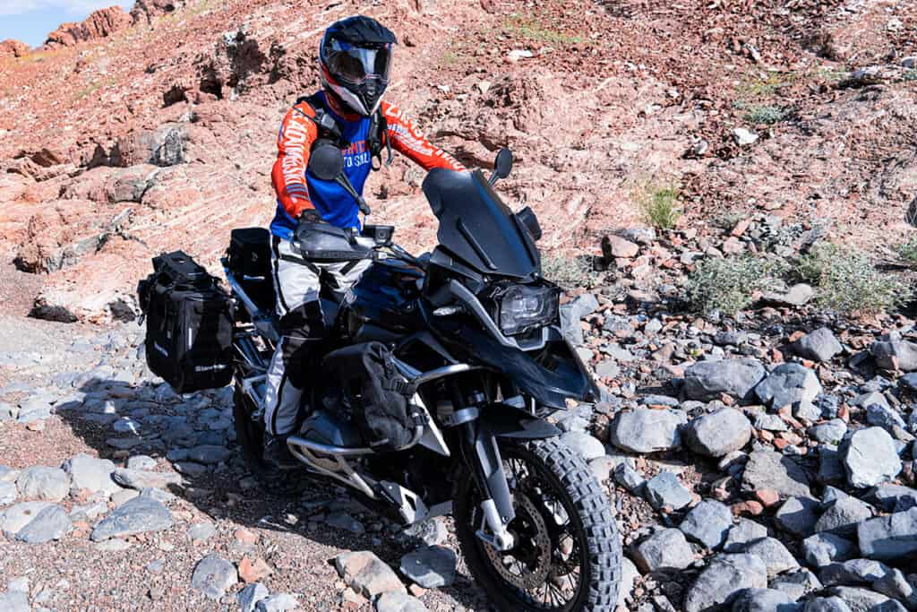 Photo of a BMWR1200GS motorcycle riding in rocky terrain
