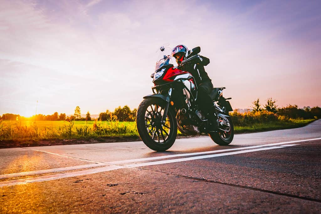 Motorcycle driving on asphalt
