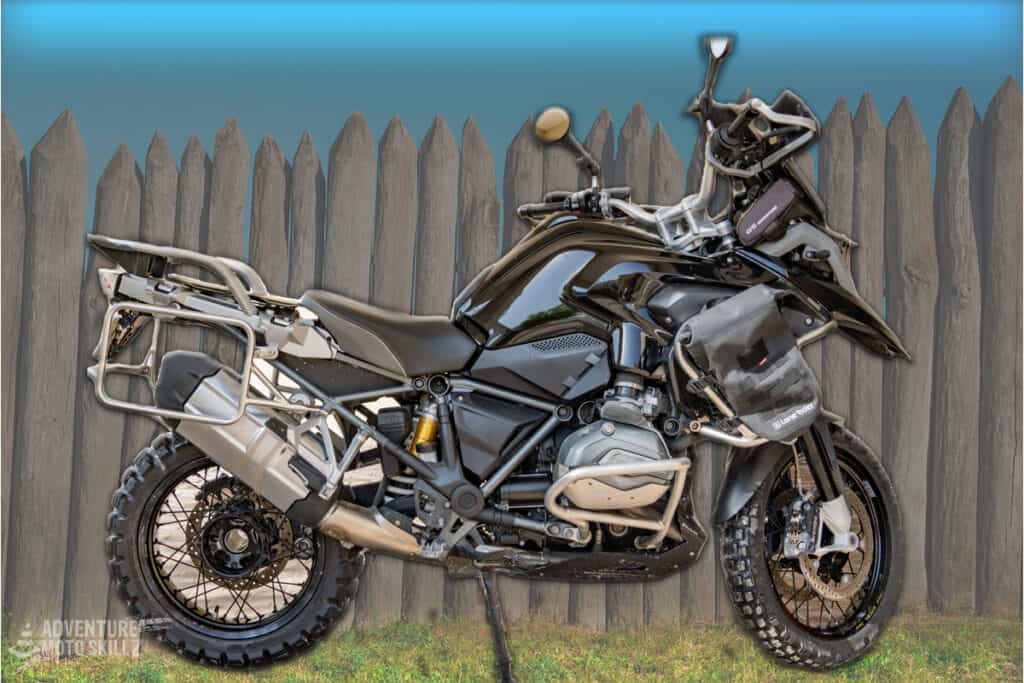 BMW R1200GS in front of fence