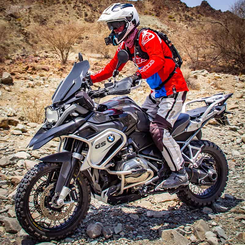 BMW 1200GS motorcycle riding on off-road rocky terrain