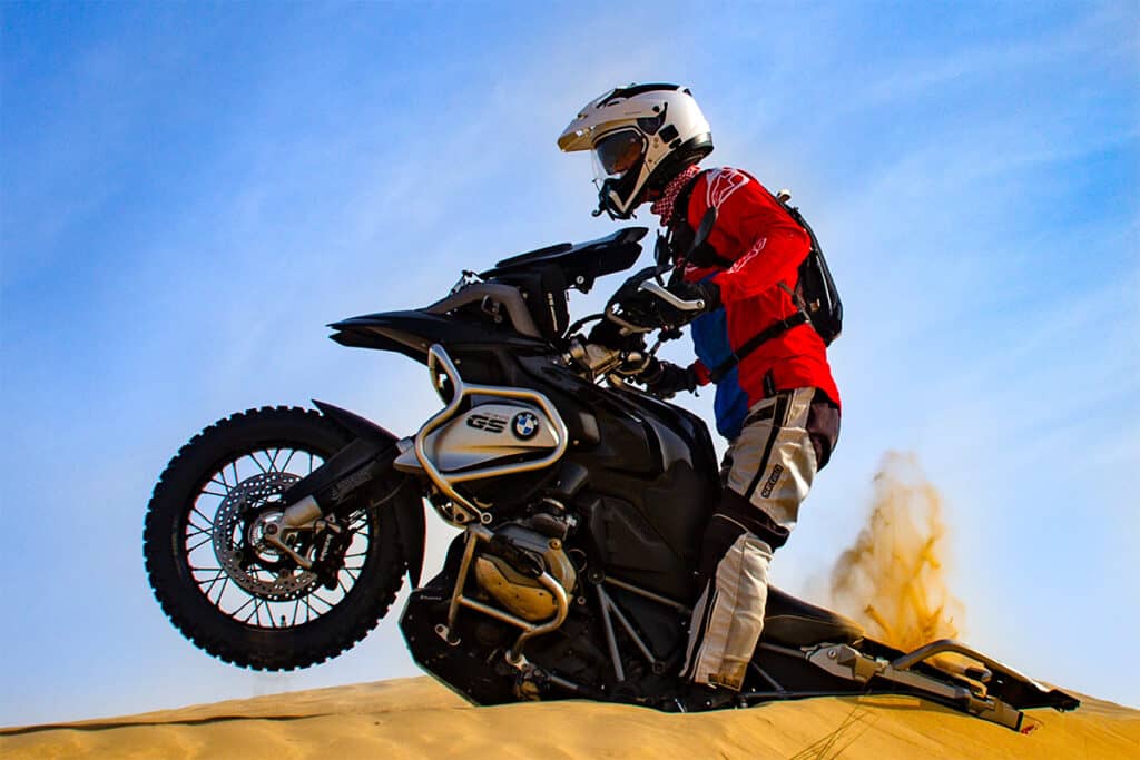 BMW R1200GS motorcycle and rider stuck in sand