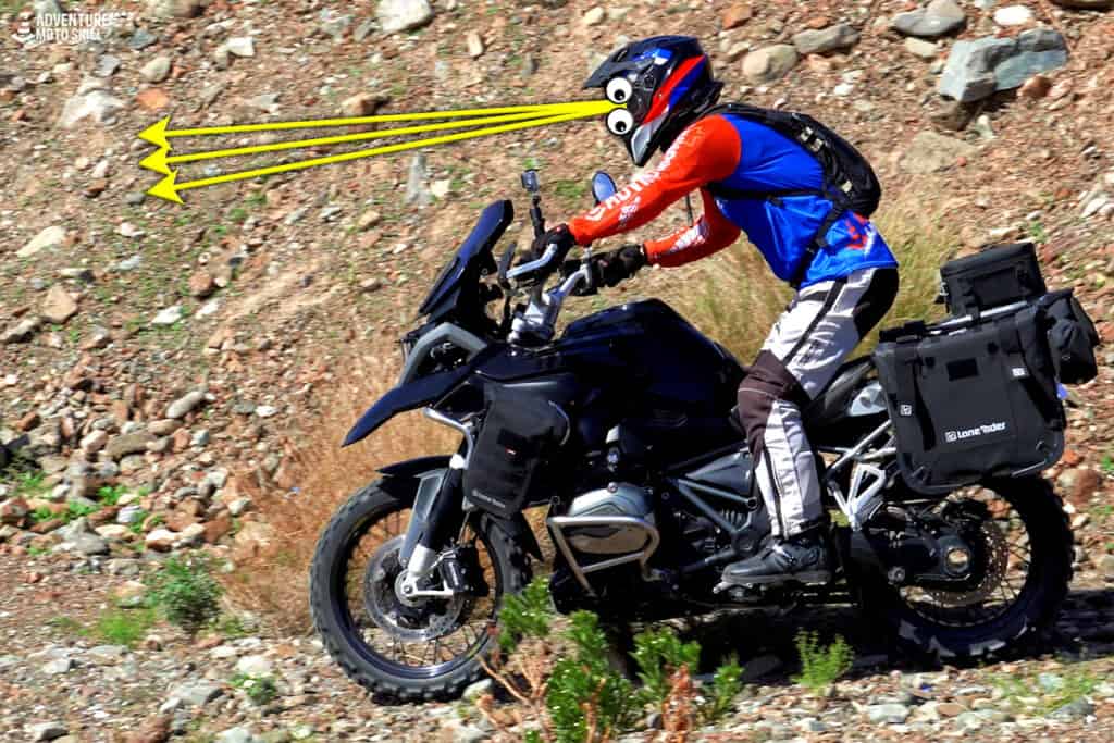 Adventure motorcycle rider in standing position