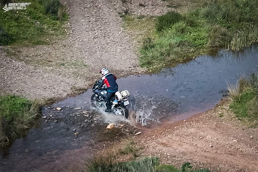 BMW motorcycle water crossing with Motoxplorers